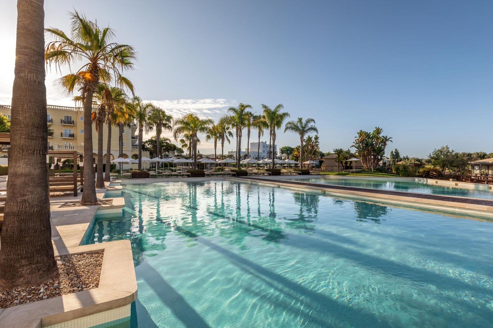 Domes Lake Algarve, Autograph Collection Віламора Екстер'єр фото The swimming pool at the hotel
